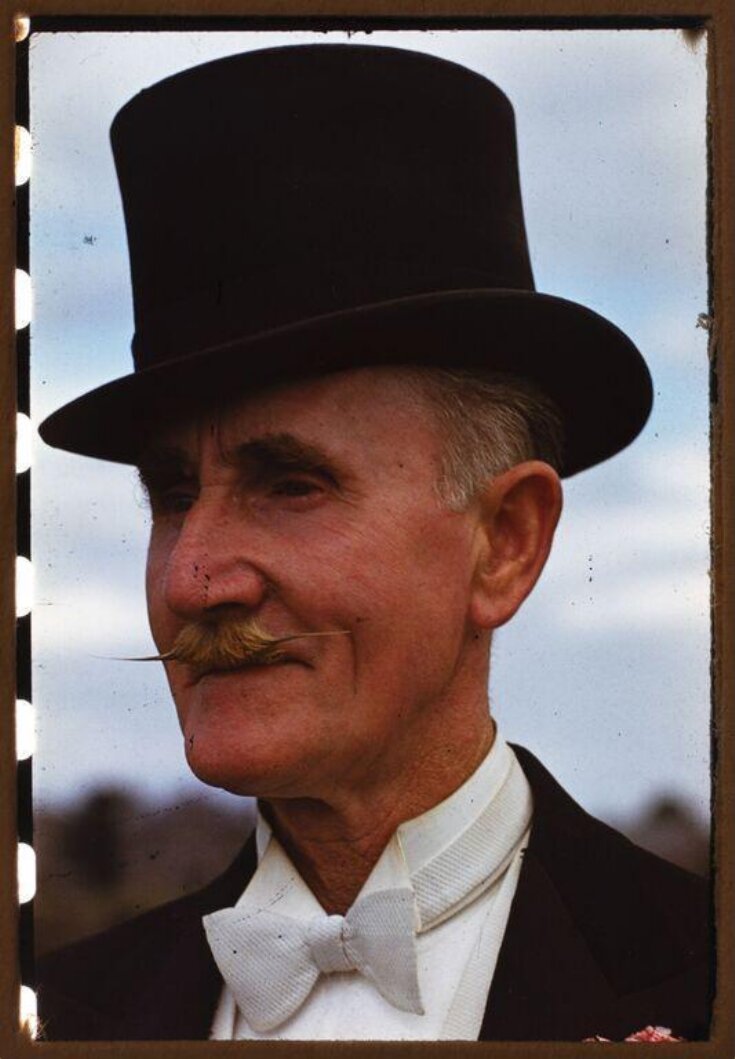 portrait of a man in a top hat top image