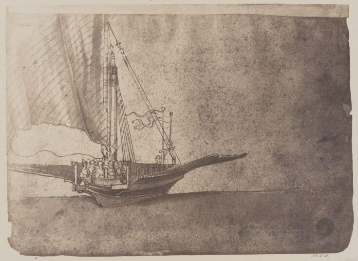 Galley with the sails set and the oars raised top image