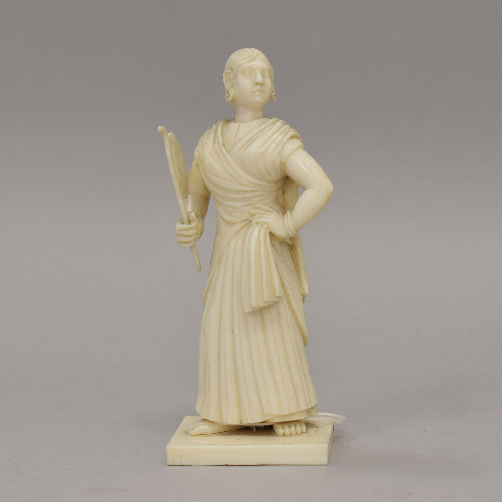 Woman with punkah, 19th century