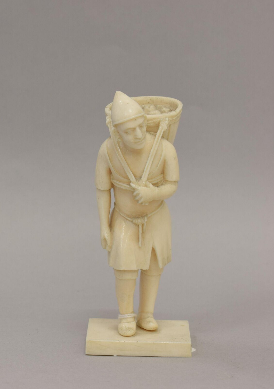 Man carrying basket, 19th century