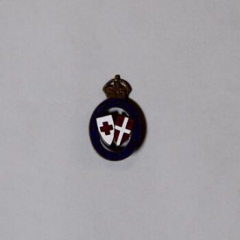 British Red Cross Society and Order of St John badge, belonging to Mrs Gabrielle Enthoven