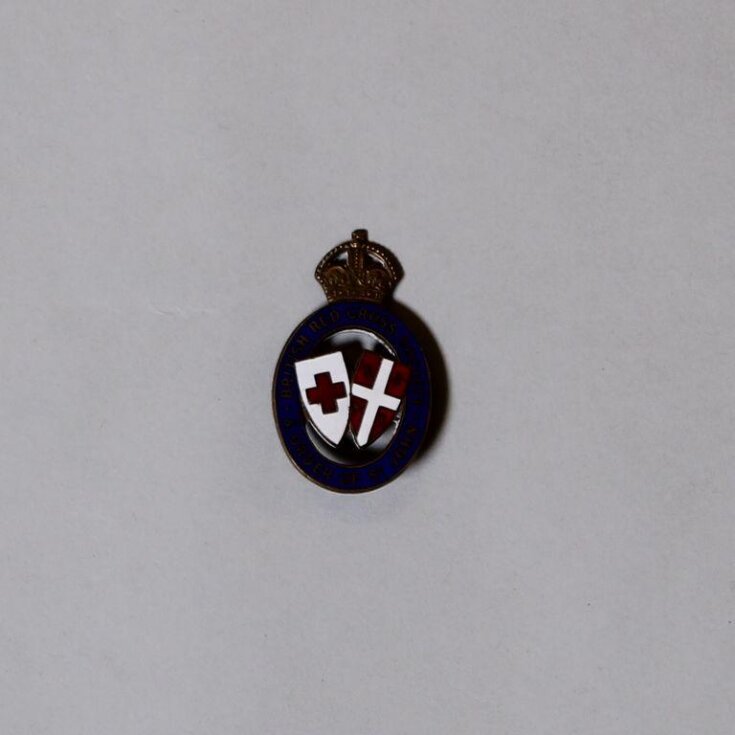 British Red Cross Society and Order of St John badge, belonging to Mrs Gabrielle Enthoven image