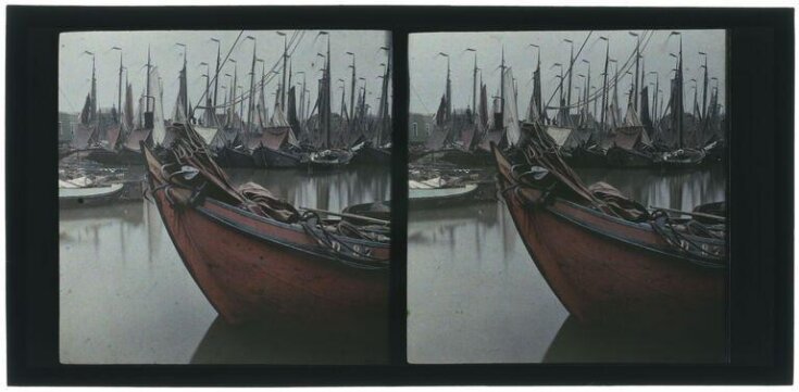 Boats in a harbour top image