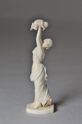 Woman holding up an infant, 19th century