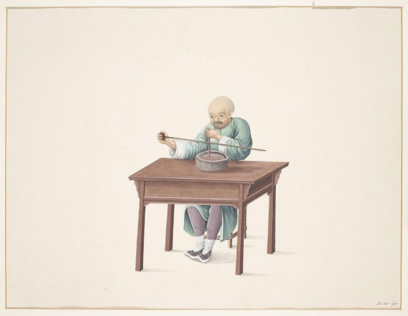 Man Drilling Seed Pearls