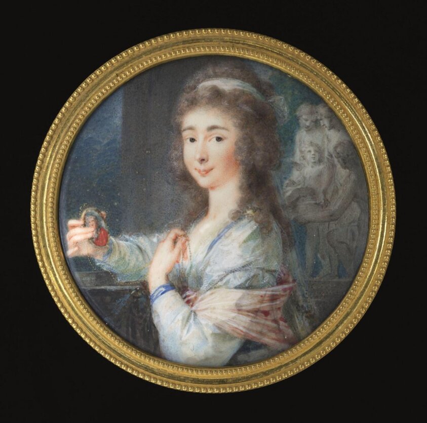 Portrait Miniature of an Unknown woman holding a miniature