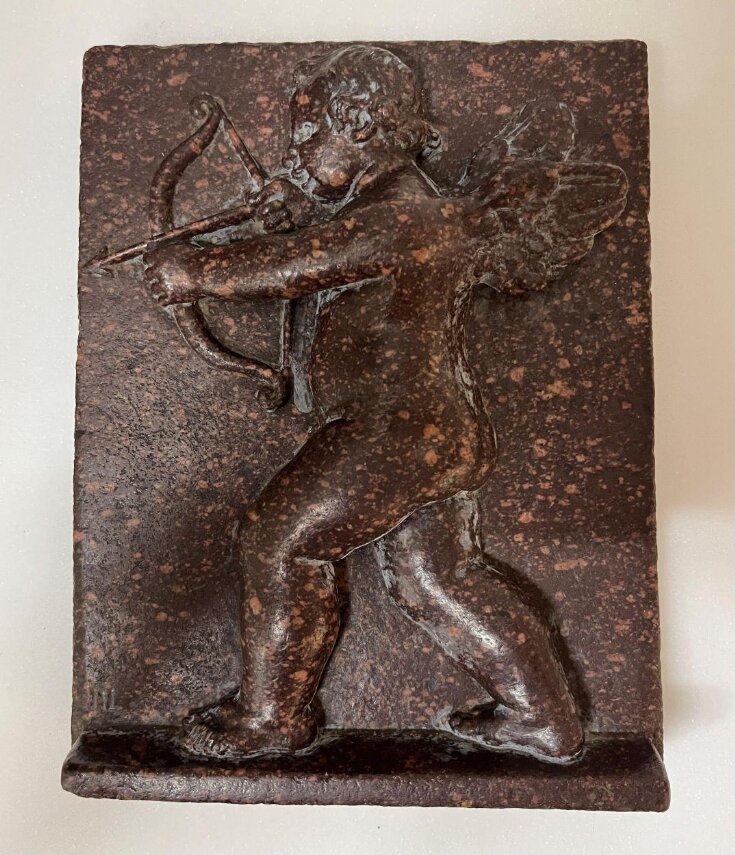 Cupid firing a bow and arrow top image