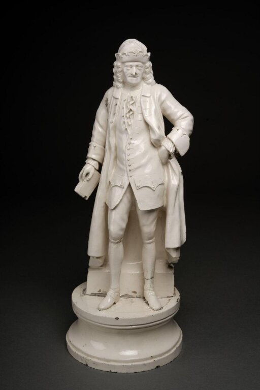 Statuette of Voltaire, Queen's ware, Josiah Wedgwood and Sons, Etruria, 19th century at the Victoria and Albert Museum