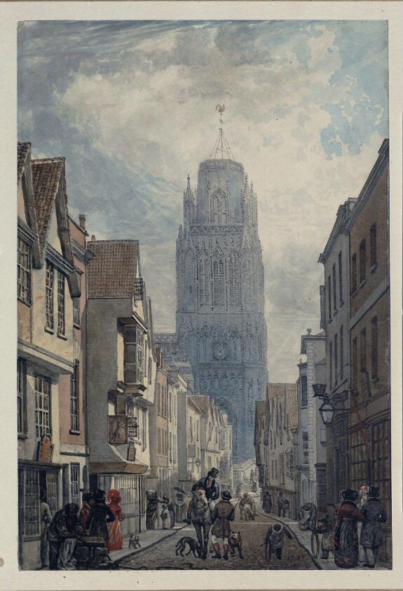 A street in Bristol with the tower of the Church of St. Mary Redcliffe