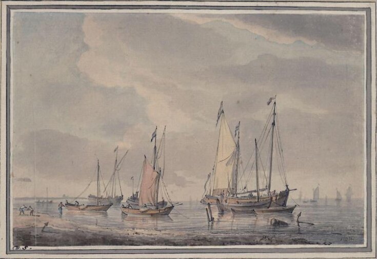 Seashore with fishing vessels at anchor top image