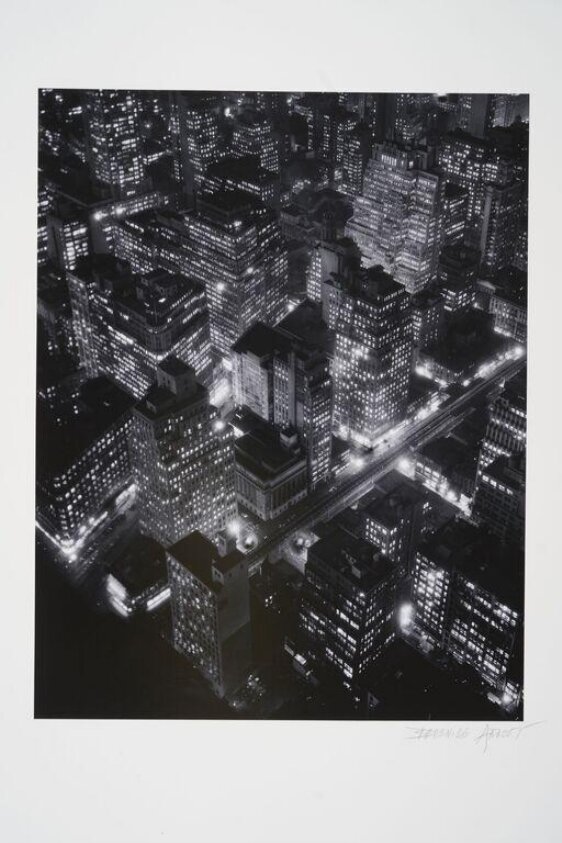 New York at Night (Exchange Place from Broadway) (1934) by Berenice Abbott
