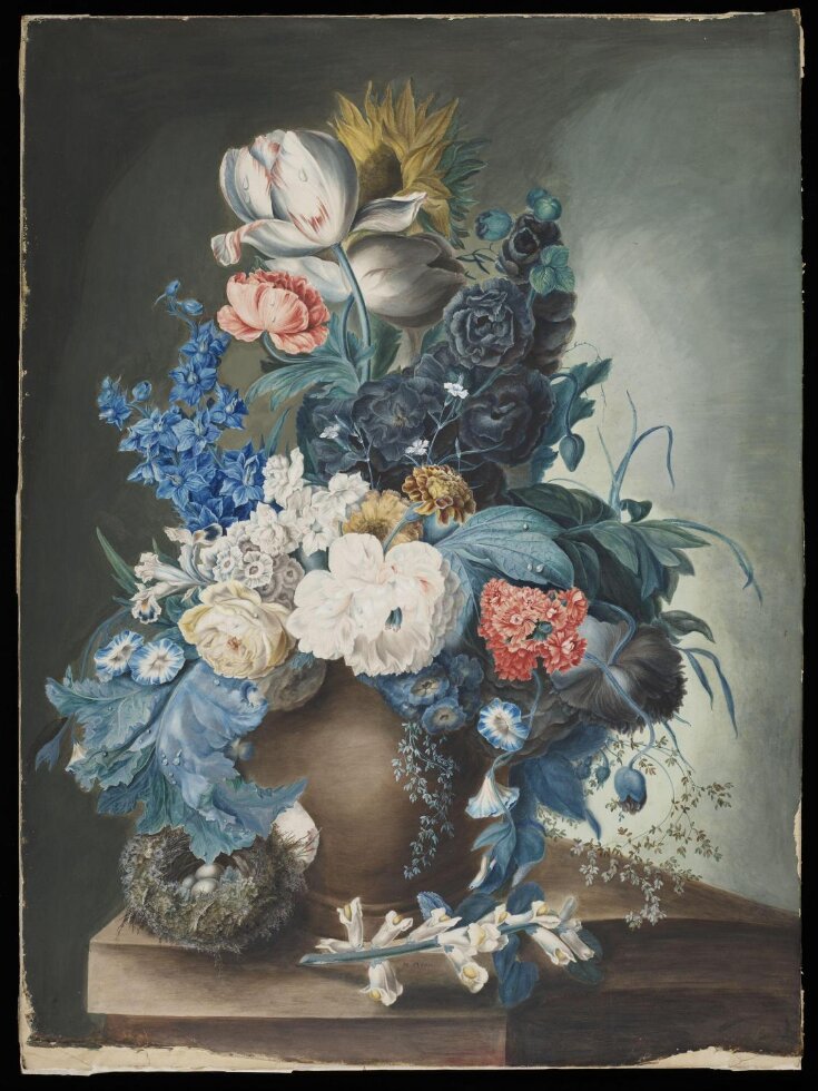 A group of flowers in a jar and a bird's nest top image