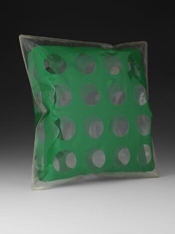 Green inflatable PVC pillow with circles