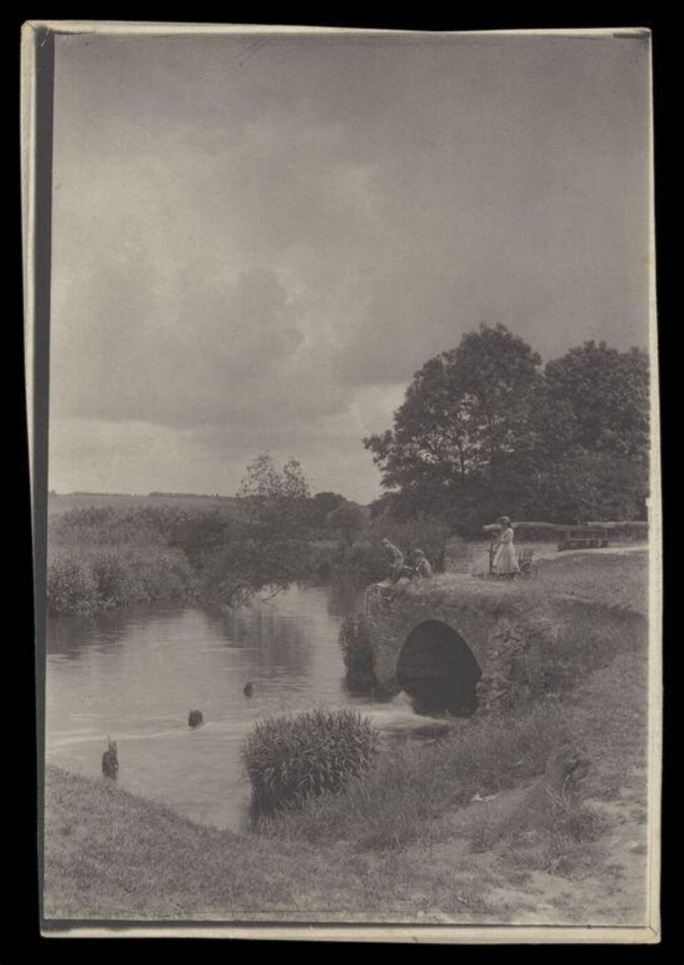 Gale, Lt. Col. Joseph, Three figures by a water tunnel and river