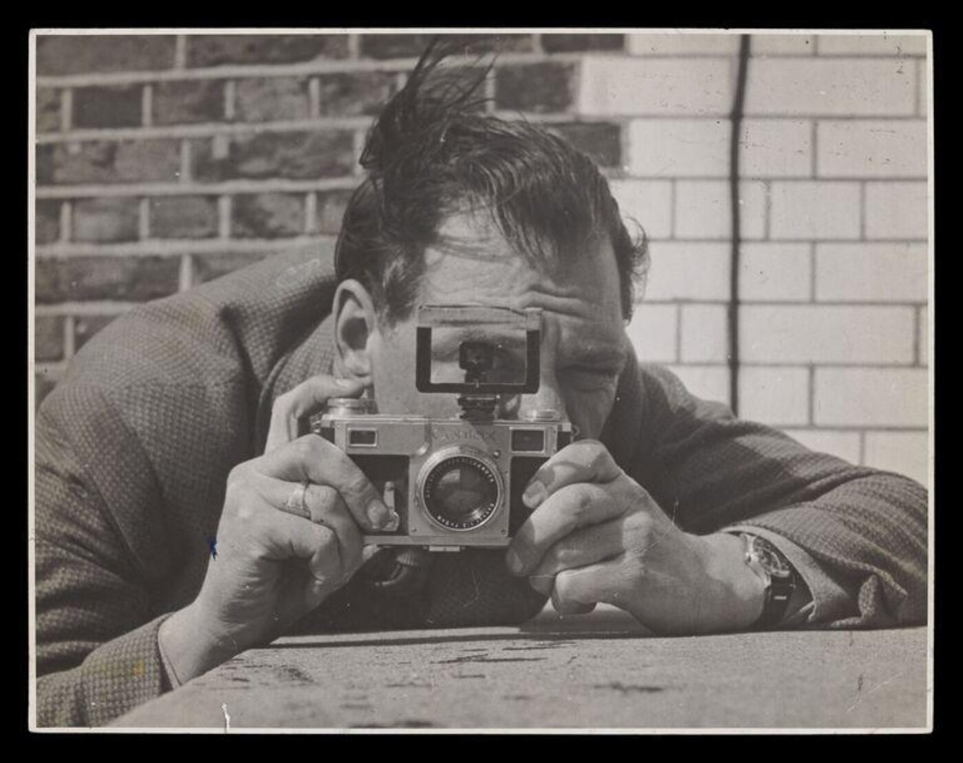 unknown, Bert Hardy holding a camera