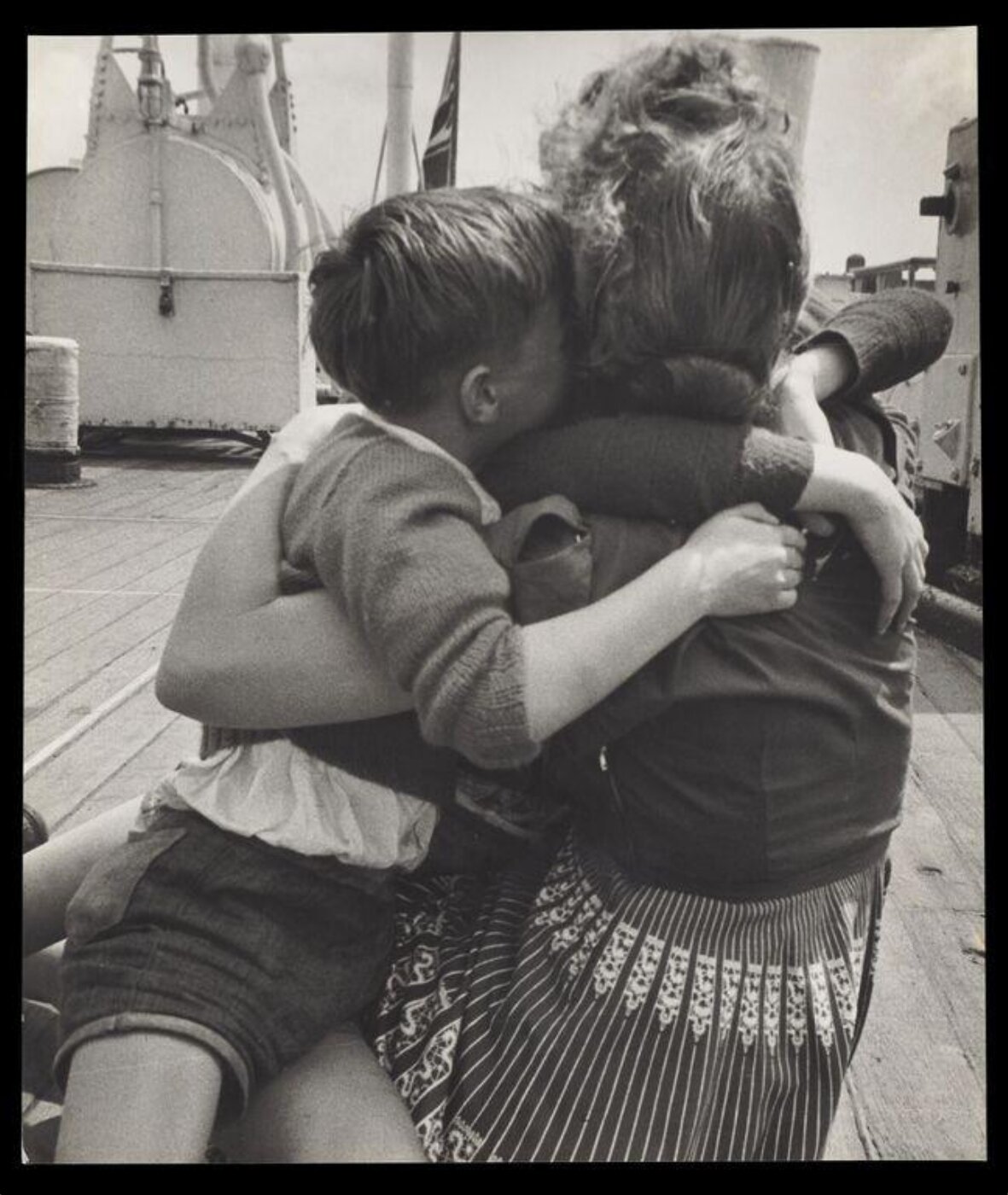 Hardy, Bert, Five children stow away, sail 10,000 miles, to each A MOTHER'S ARMS