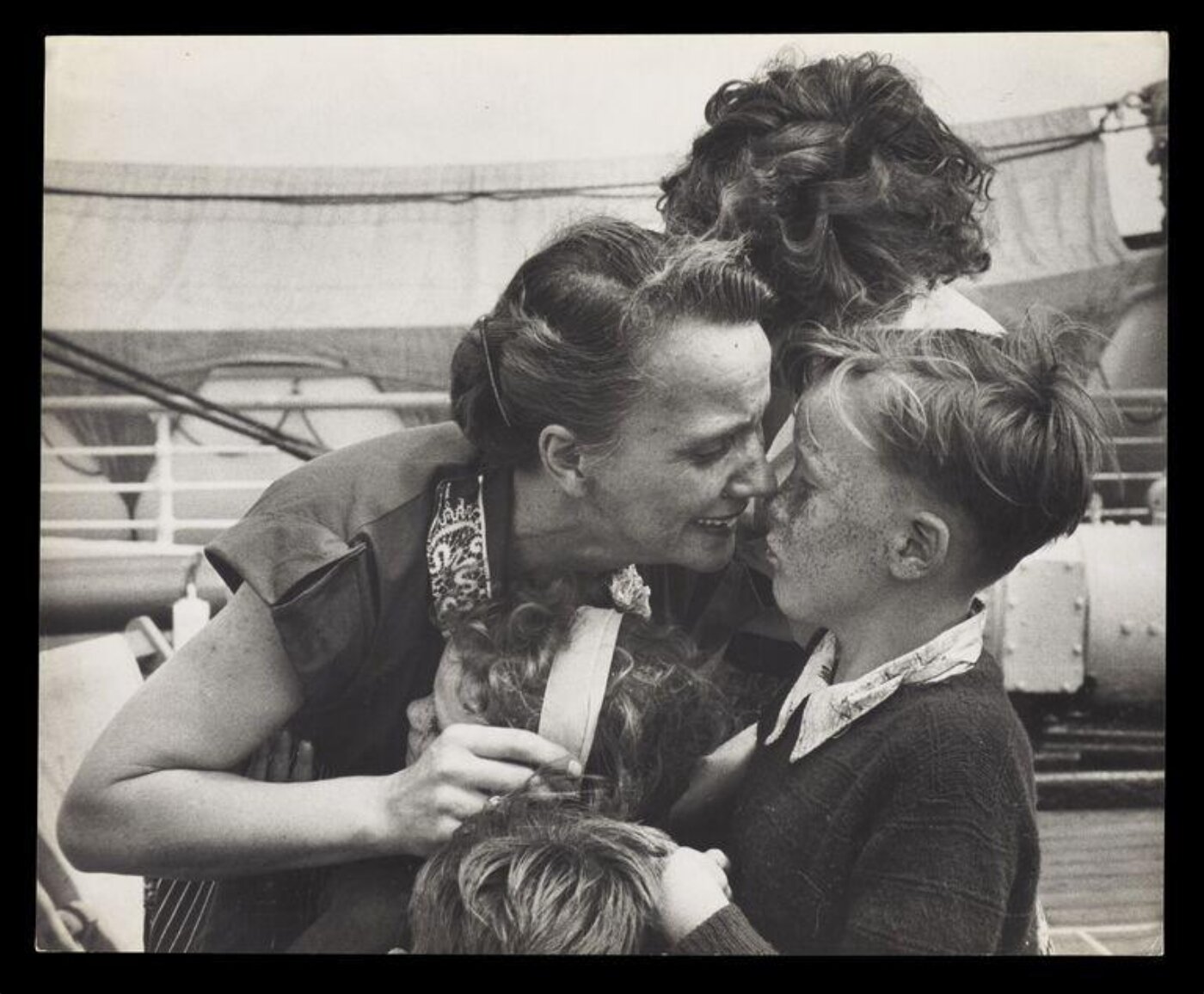 Hardy, Bert, Five children stow away, sail 10,000 miles, to each A MOTHER'S ARMS