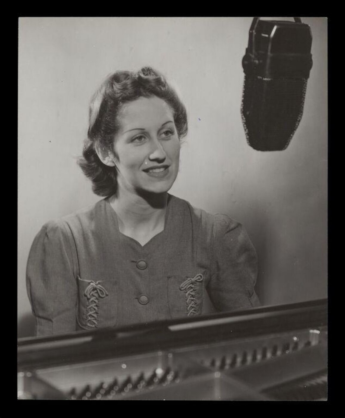 Hinde, John Wilfrid, Woman Sitting at a Microphone