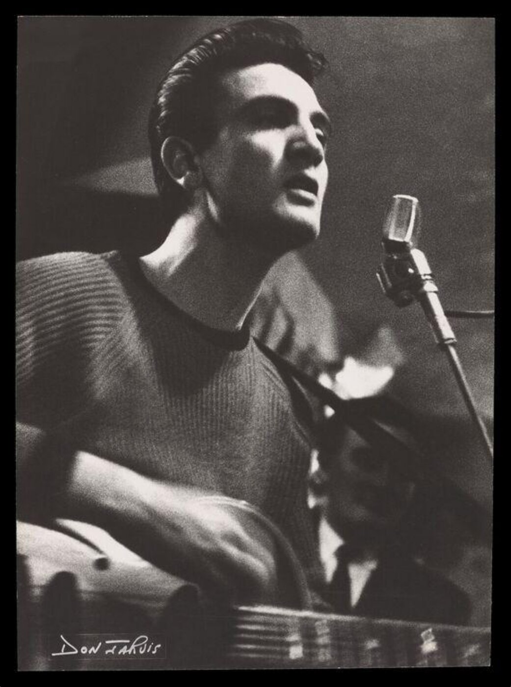 Jarvis, Don, Side View of a Singer Playing Guitar